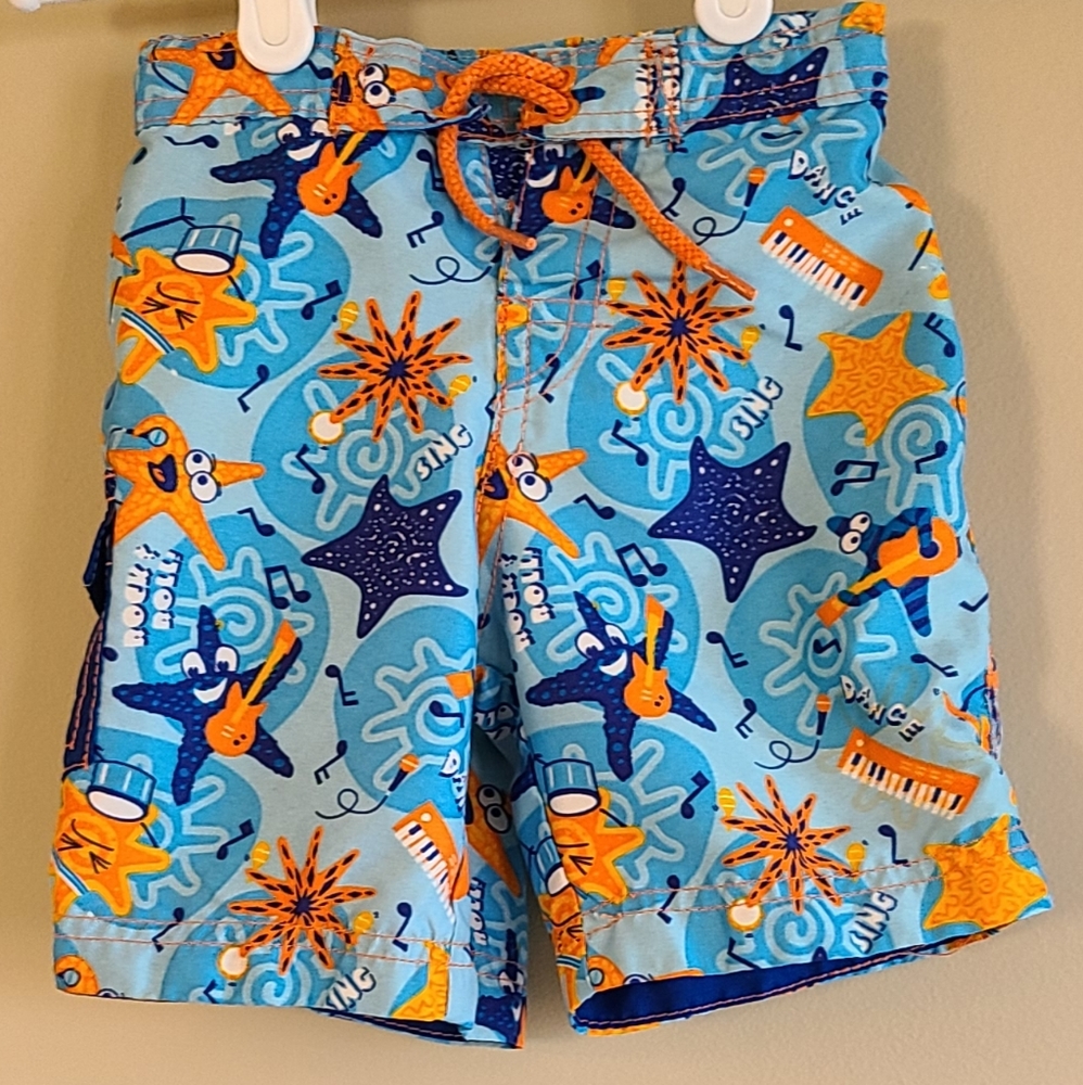UV Skinz blue and orange mesh lined swim trunks